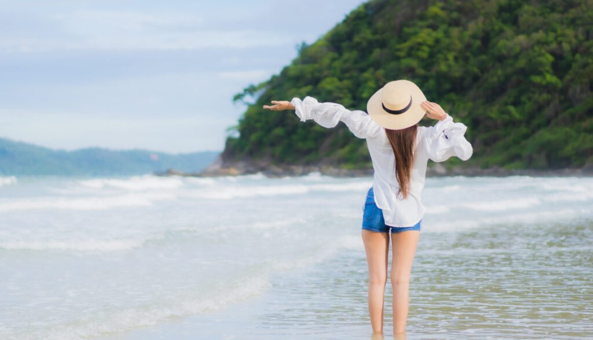 Portrait beautiful young asian woman relax smile around beach se